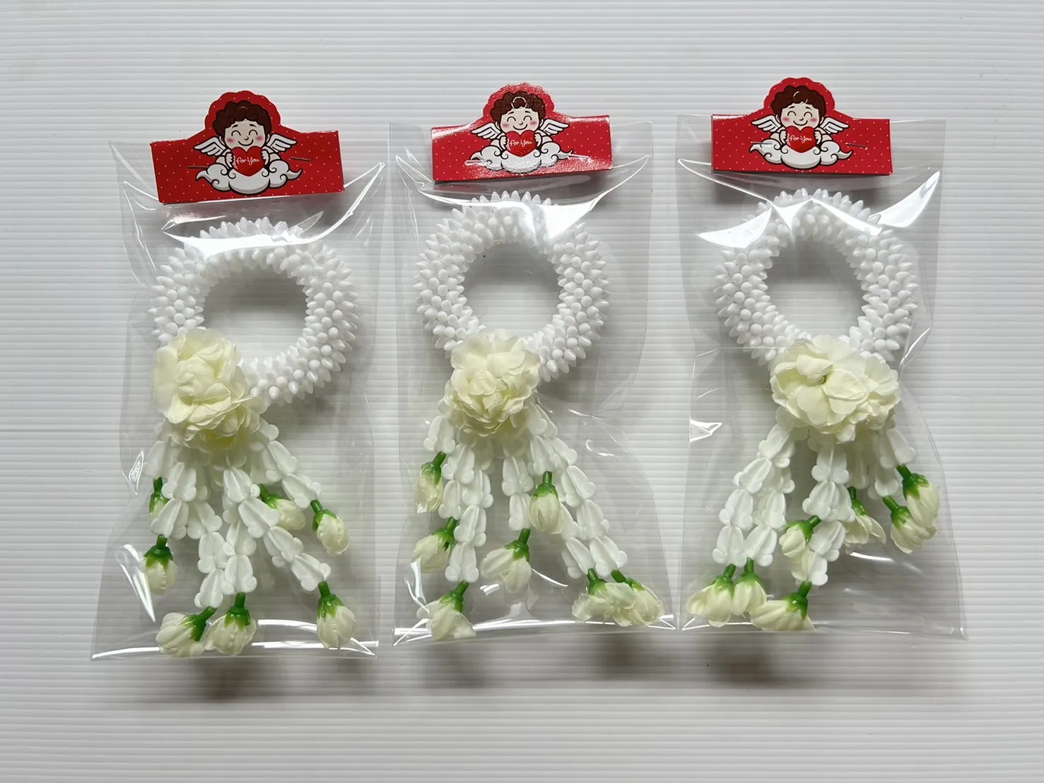 มาลัยมะลิสีขาว กลมวันแม่ 3 นิ้ว  ชายดอกมะลิตูม ซองใส (1*12) CR0041